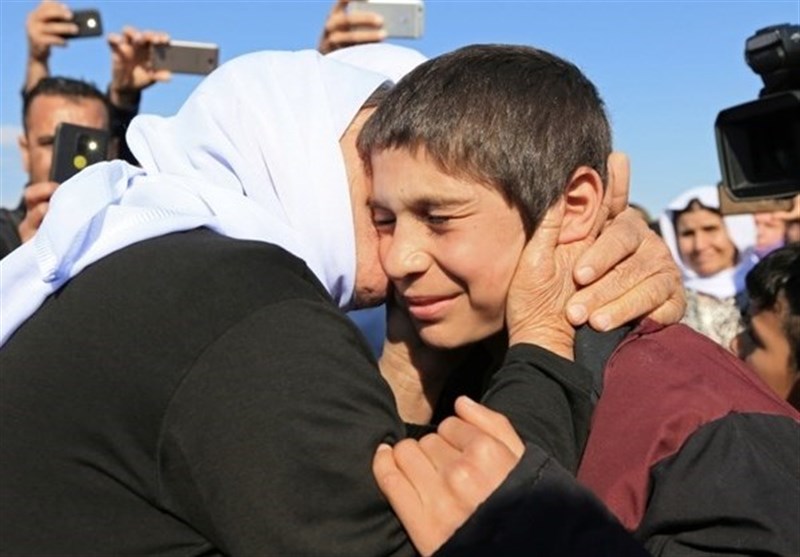 Released Izadi Women, Kids Reunite with Families in Iraq