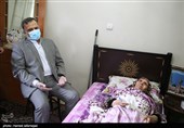عیادت علیرضا رشیدیان رئیس سازمان حج و زیارت  از همسر شهید واقعه منا حاج ولی سلطانی
