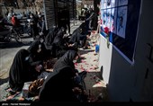 حضور خانواده‌های شهدای آتش‌نشان مقابل ساختمان پلاسکو در چهارمین سالگرد حادثه پلاسکو