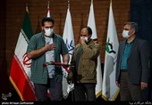 تقدیر از وحید احمدی عکاس خبرگزاری تسنیم رتبه دوم بخش عکس با موضوع کمک های مؤمنانه