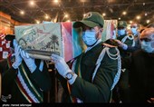  ادای احترام به دوشهید گمنام دفاع مقدس در مراسم بزرگداشت دومین سالگرد شهادت شهید اصغر پاشاپور از یاران نزدیک شهید حاج قاسم سلیمانی