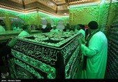 آیین تعویض روپوش ضریح مطهر امامین عسکریین (ع) - سامرا