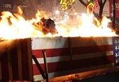 ببینید|اعتراضات ضدآمریکایی در آرژانتین با آتش زدن پرچم آمریکا