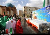 مراسم اهتزاز پرچم امام رضا (ع) بر فراز شهر همدان