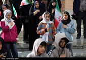 مراسم اهتزاز پرچم امام رضا (ع) بر فراز شهر همدان