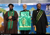 مراسم اهتزاز پرچم امام رضا (ع) بر فراز شهر همدان