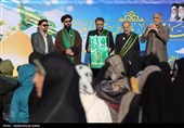 مراسم اهتزاز پرچم امام رضا (ع) بر فراز شهر همدان