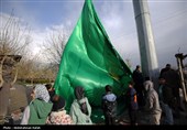 مراسم اهتزاز پرچم امام رضا (ع) بر فراز شهر همدان