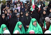 مراسم اهتزاز پرچم امام رضا (ع) بر فراز شهر همدان
