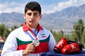 پیکر قهرمان سابق ووشوی جهان در مینودشت تشییع شد