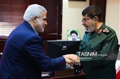 سردار رمضان شریف،رئیس مرکز اسناد و تحقیقات دفاع مقدس و مجید قلی زاده مدیر عامل خبرگزاری تسنیم 