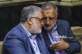 علیرضا زاکانی شهردار تهران و محمد معتمدیان استاندار تهران  در مراسم یادبود بدرالسادات عراقچی