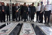 غبارروبی و عطرافشانی مزار شهدای امامزاده محمد(ع) کرج