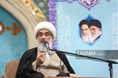 وداع پرشور مردم قم با پیکر شهید آقایی