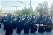 زنان مسلح بسیجی در اجتماع 30 هزار نفری جان‌فدایان بیرجند