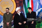 احمد دنیامالی، وزیر ورزش و جوانان و  حجت‌الاسلام‌ محمدجواد حاج علی اکبری، امام جمعه موقت تهران در تجدید میثاق مدال‌آوران المپیادهای علمی و قهرمانان ورزشی با امام مجاهد شهید