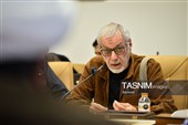 مراسم اهدای نشان خادمی به عکاسان در مسجد مقدس جمکران