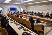 مراسم اهدای نشان خادمی به عکاسان در مسجد مقدس جمکران
