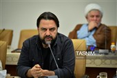 مراسم اهدای نشان خادمی به عکاسان در مسجد مقدس جمکران