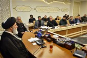 مراسم اهدای نشان خادمی به عکاسان در مسجد مقدس جمکران